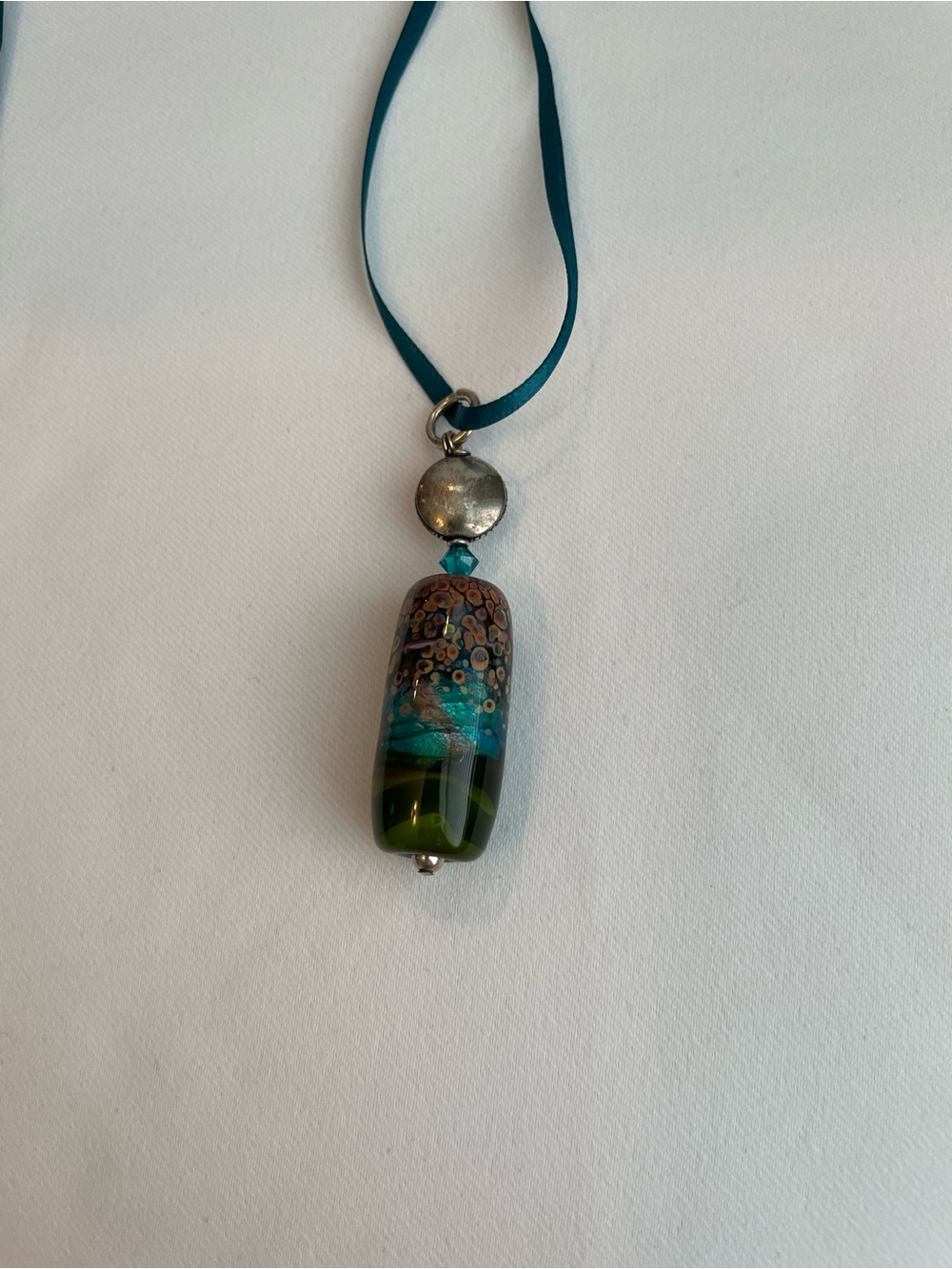 Murano style lampwork glass pendant Earthy boho Encased Reactive Silver Glass